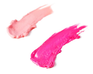 Image showing Smeared, studio and isolated glossy lipstick, makeup and cosmetics on white background. Trendy, bright colour for creative beauty with artistic and texture smudged in beautiful vibrant pink shades