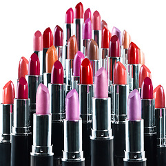 Image showing Lipstick, makeup and color in studio for variety, beauty and luxury product on white background. Closeup, aesthetic and dermatology for lip grooming, choice and group for selection in mockup display