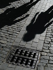 Image showing Shadows of people on street