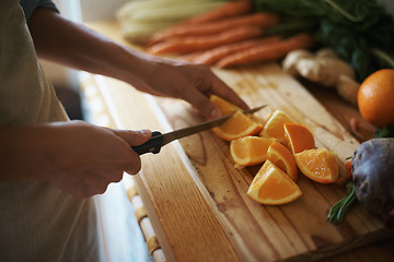 Image showing Closeup, kitchen and fruits with hands, orange or wood board with knife, vegetables or salad. Person, vegan or chef with utensils or ingredients for lunch or supper with healthy meal, home or dinner