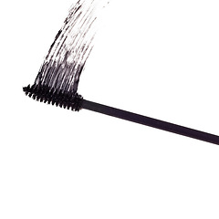 Image showing Black brush, mascara and makeup for eyelash, creativity or cosmetics for beauty, art and isolated on white background. Abstract, tools or smudge of product for test, stroke or cosmetology in studio