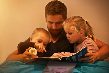 Image showing Night, kids or dad reading book in home for learning, education or storytelling in bedroom for care. Family, relax or father with children siblings for a fantasy with a girl, boy or support for love