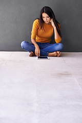 Image showing App, social media and internet for woman on floor with tablet for online, web and info on weekend. Blogger or content creator with finger on screen for engagement and tech for browse and relax