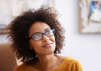 Image showing Thinking, calm and relax woman in home lounge, smile and eyewear for happy lady. Apartment, dreaming or wondering with hope for African women person, ideas and possibilities in living room of house