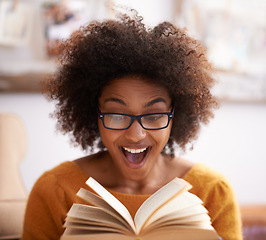 Image showing Book, excited and happy woman in home lounge, reading and shocked expression. Pages, relax and novel or fiction for female reader with glasses, literacy or knowledge for hobby and surprise story line