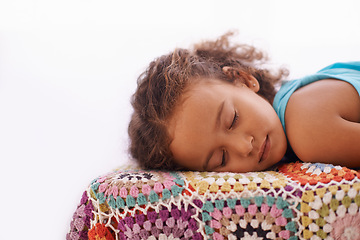 Image showing Child, sleeping and relax on bed in home, dreaming and wellness on quilt blanket for childhood development. Girl, tired or rest in bedroom on summer vacation, peace or comfort for cozy break in house