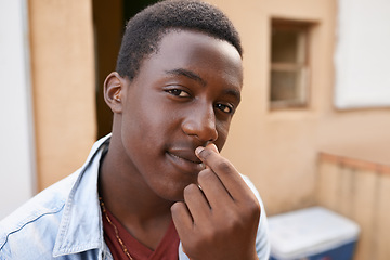 Image showing Portrait, teenager and African boy with confidence in backyard for relax, chill and youth lifestyle outdoors at home. Black person, pride and hand with gesture for cool, denim and jacket at house