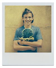 Image showing Portrait, skateboard and happy teenager on a wall background for sports, polaroid or fashion picture in Australia. Cap, skater and smile of young boy with a hat for instant photograph on mockup space