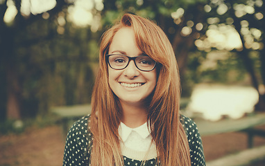 Image showing Nature, smile and portrait of woman in forest for vacation, peace and travel with tourism in Brazil. Glasses, female person and face with happiness for adventure, wellness or getaway at retreat