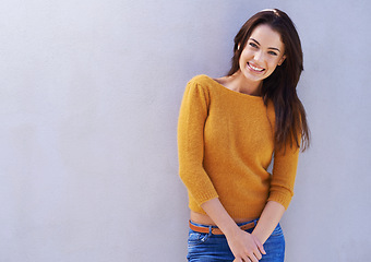 Image showing Portrait, fashion and happy woman on a purple wall, model or girl in outfit isolated on a background mockup space. Smile, trendy and young female person in casual clothes or stylish sweater in Italy