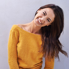 Image showing Portrait, fashion and happy woman on a wall, model or funny girl laughing isolated on a purple background. Smile, face and young female person in casual clothes, trendy or stylish sweater in Italy