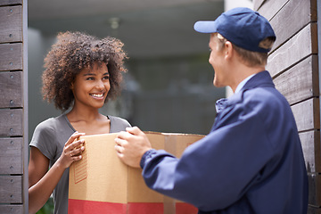 Image showing Courier, home and delivery box with woman and package with a smile from shipping order. House, happy and shipment with man giving a cardboard parcel from moving company with distribution service