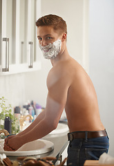 Image showing Man, foam for shaving and grooming in portrait, skincare and beauty with morning routine in bathroom. Skin health, cosmetic cream or soap for hygiene, dermatology and smile at home for hair removal