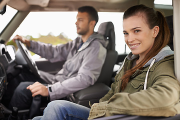 Image showing Couple, car and portrait on road trip with travel for adventure, vacation and anniversary getaway with happiness in nature. Woman, man and driving in vehicle for holiday journey, tourism or honeymoon