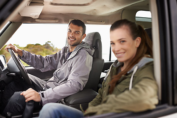 Image showing Couple, man and portrait on road trip with travel for adventure, vacation and anniversary getaway with happiness in nature. Woman, car and driving in vehicle for holiday journey, tourism or honeymoon