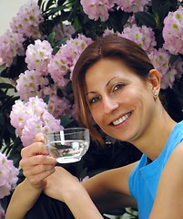 Image showing Young girl drinking water