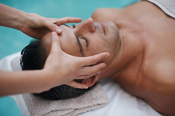 Image showing Spa, man and hands with massage for relax at resort, luxury hotel and vacation for wellness and therapeutic pamper. People, masseuse and body care with head treatment, hospitality and zen by poolside