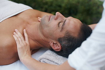 Image showing Spa, man and hands with massage for relax at resort, luxury hotel and vacation for relax and therapeutic pamper. People, masseuse and body care with shoulder treatment, hospitality and zen outdoor