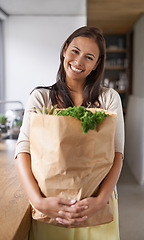 Image showing Happy woman, portrait and kitchen with grocery bag for diet, natural nutrition or healthy eating at home. Face of female person or vegetarian with smile, vegetables and fruit for health and wellness
