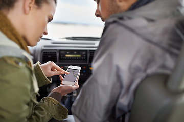 Image showing Couple, car and gps on road trip with direction for adventure, vacation or travel to destination in countryside. Woman, man or smartphone in vehicle for map and location to holiday journey or tourism