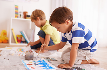 Image showing Children, paper and painting on floor in bedroom for artistic development, fun activity and art education. Brothers, drawing and relax at home for learning, creative hobby and bonding together