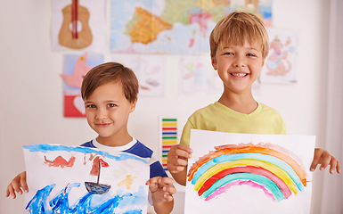 Image showing Paper, art and portrait of children with presentation for painting, display and poster in playroom. Smile, brothers and kids with drawing with happiness for creative, project and homework in house