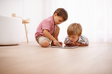 Image showing Tablet, kids and siblings on a floor with cartoon, gaming or streaming movie at home. Digital, learning and boy children in house for google it, search or ebook storytelling, app or Netflix and chill