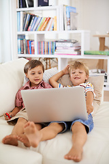 Image showing Laptop, smile and kids on sofa in home to relax, learning and family streaming cartoon on internet together. Computer, children and boys in living room for education, movies or brothers with games