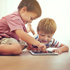 Image showing Children, siblings and tablet on a floor with cartoon, gaming or streaming movie at home. Digital, learning and boy kids in house for google it, search or ebook storytelling, app or netflix and chill