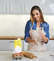 Image showing Happy woman, baking and clapping hands with flour, dough or smile with ingredients in kitchen at home. Cooking, wheat and person with dust for pastry, food or eggs of chef with powder for preparation