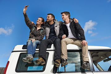 Image showing Friends, car and selfie in smile with smartphone for adventure, holiday and road trip to travel in Australia. People, happy and excited for vacation or break with bonding for memory and together.