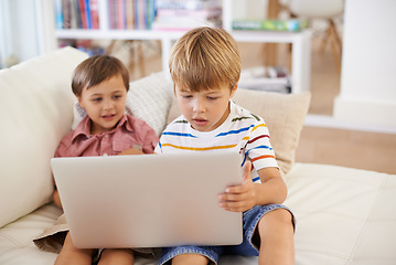 Image showing Laptop, love and kid siblings on a sofa with cartoon, film or streaming movie at home. Computer, e learning or children in a living room for google it, search or gaming app, show or Netflix and chill