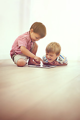 Image showing Kids, tablet and happy siblings on floor for funny cartoon, gaming or movie at home. Digital, learning and boy children in house for google it, search or ebook storytelling, app or Netflix and chill