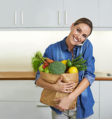 Image showing Happy woman, grocery bag and phone call with vegetables for conversation, communication or shopping at home. Female person, customer or shopper smile on mobile smartphone for ingredients in kitchen