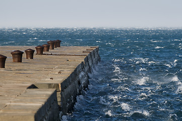 Image showing Waves against pier