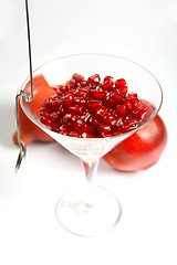 Image showing Pomegranate seeds in a glass