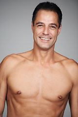 Image showing Man, shirtless and smile for strength, strong and health for growth and development in body. Mature person and happy with confidence for chest, muscular and masculine for wellness, fit and care