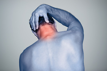 Image showing Neck pain, injury and man with tension, inflammation and discomfort from stress, strain and pressure in back view. Male person, body and red glow for wound, bruise and trauma in studio background