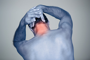 Image showing Studio, man and hands for neck pain or tension with muscle inflammation, discomfort and sprain of stress or strain. Red glow, back view and person with body ache, injury and bruise on grey background