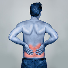 Image showing Medical, back pain and man with injury in studio with inflammation, discomfort or muscle sprain. Red glow, shirtless and person with healthcare emergency, ache or strain isolated by gray background.