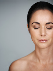 Image showing Skincare, cosmetics and beauty for woman in studio for dermatology, wellness and clean for hygiene on mockup. Mature person and model with glow and gloss for makeup and cleanse for care and facial