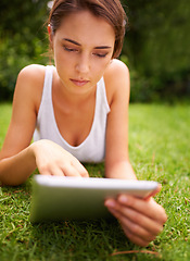 Image showing Tablet, online and woman relax in backyard or park for social media for chatting and texting on site of app. Peace, nature and female person in summer with ebook, connection and internet for reading