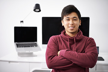 Image showing Laptop, portrait and smile of man for software in office with information technology for cybersecurity. Coder, programmer and male person with arms crossed in workplace with monitor of computer