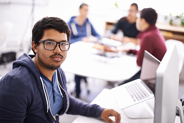 Image showing Office, laptop and portrait of employee man at desk for digital agency, planning and internet research. Workplace, technology and face of male worker for online project, strategy and information