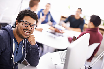 Image showing Happy man, portrait and laughing with glasses in creative startup, research or development at office. Face of male person, nerd or geek with smile for technology or digital career at the workplace