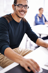 Image showing Happy man, portrait and glasses with computer for research and development in creative startup at office. Handsome male person, nerd or geek working on desktop PC for design or project at workplace