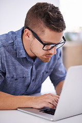 Image showing University, glasses and man with laptop for research, study or elearning with education, knowledge and opportunity. Computer, reading and college student writing report for online course at desk.