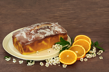 Image showing Orange Drizzle Cake with Fruit and Spring Blossom