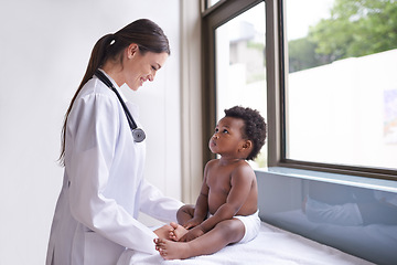 Image showing Clinic, pediatrician and woman with baby, boy and checkup with wellness and doctor in an exam. Medical, professional and employee with healthcare and infant with appointment and medicare with smile