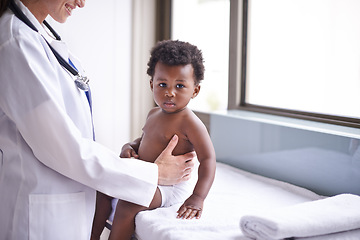 Image showing Baby, pediatrician and healthcare wellness or consultation as childhood development checkup, examination or ill. Patient, kid and medic support on hospital bed in Kenya for diagnosis, flu or clinic